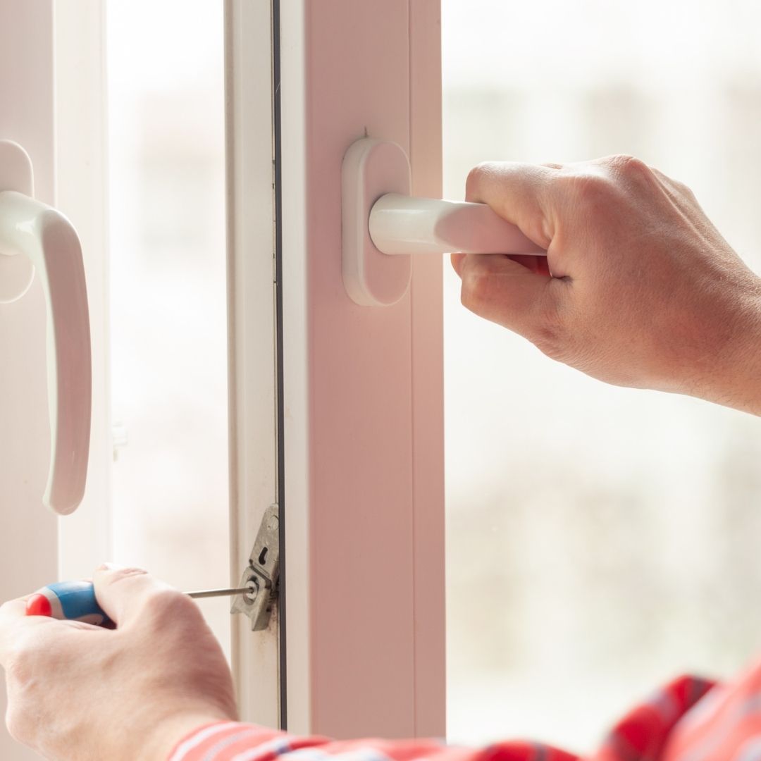 Man fixing a Double Glazed Window in Bexley