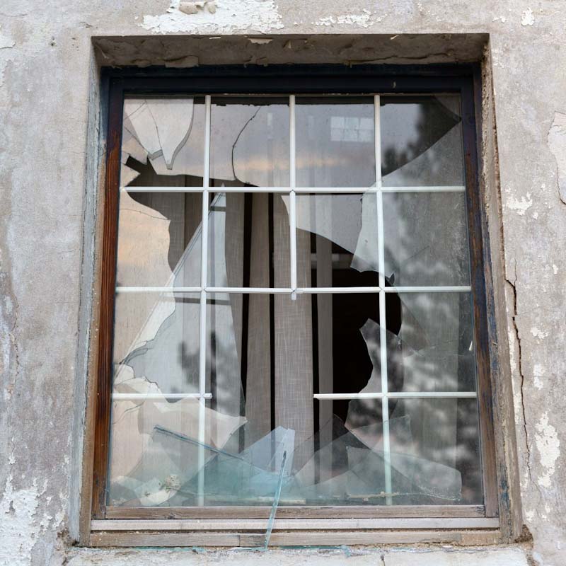 Smashed Glass window in Tower Hamlets