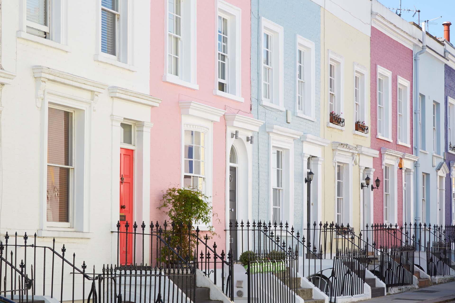 a row of terraced houses in a street